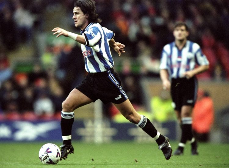 19 Dec 1998:  Benito Carbone of Sheffield Wednesday strides forward against Liverpool in the FA Carling Premiership match at Anfield in Liverpool, ...