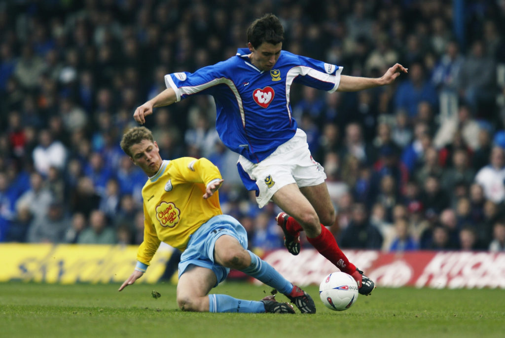 Svetoslav Todorov of Portsmouth skips past Steve Haslam of Sheffield Wednesday